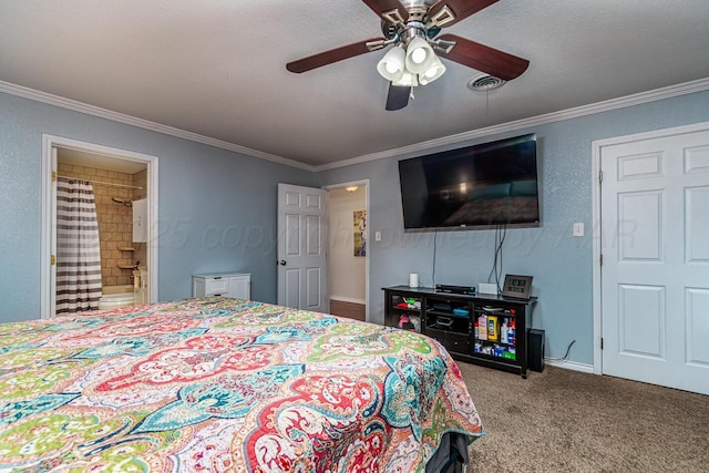 bedroom with ceiling fan, carpet, crown molding, and ensuite bath