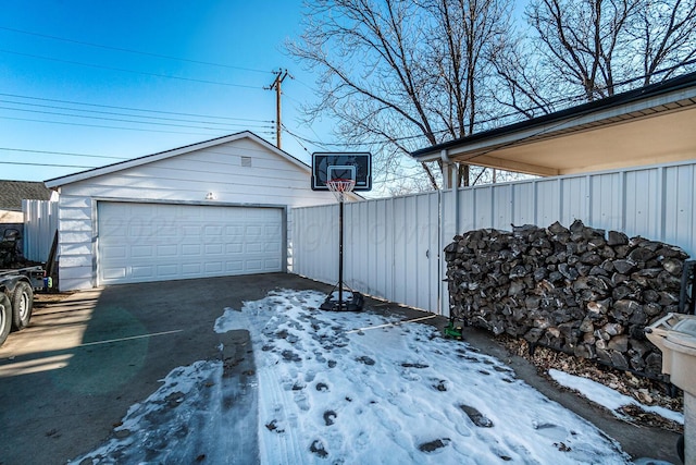 view of snow covered garage