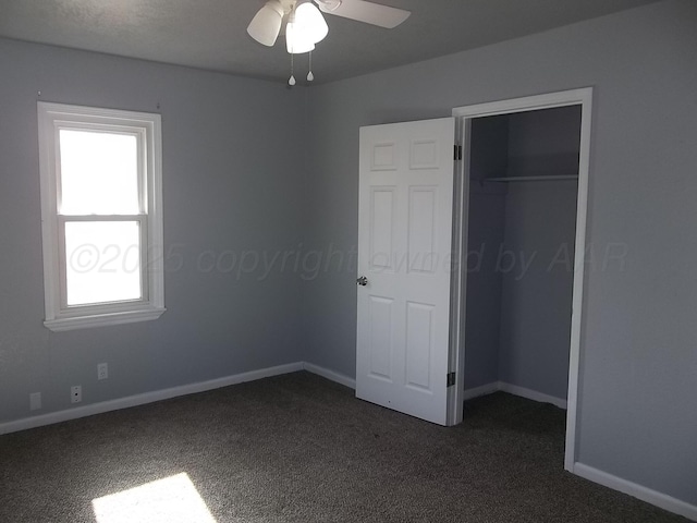 805 Brevard St, Hereford, TX 79045 - unfurnished bedroom with dark colored carpet and a closet