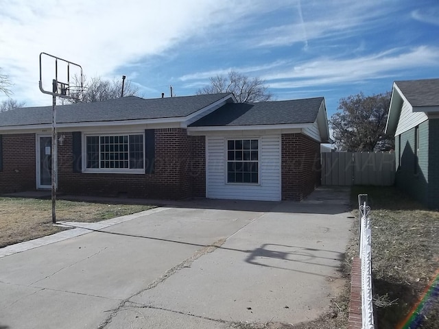 805 Brevard St, Hereford, TX 79045 - ranch-style house featuring brick siding, driveway, and a shingled roof