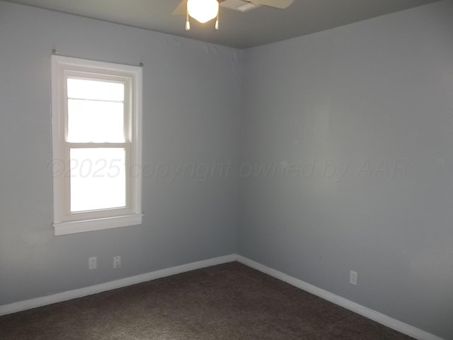 805 Brevard St, Hereford, TX 79045 - unfurnished room featuring healthy amount of natural light, dark colored carpet, and ceiling fan