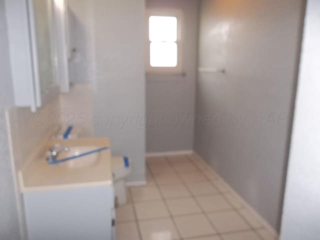 805 Brevard St, Hereford, TX 79045 - bathroom with vanity and baseboards