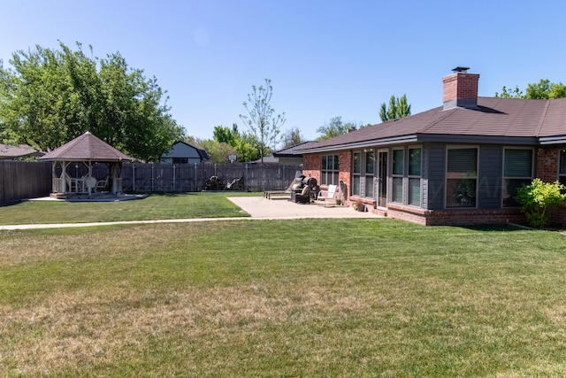 view of yard with a patio area and a gazebo