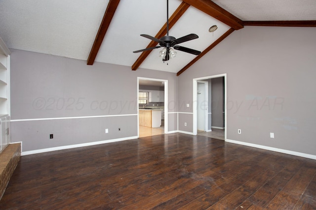 505 Alamo St, Claude, TX 79019 - unfurnished living room featuring ceiling fan, beamed ceiling, wood finished floors, baseboards, and high vaulted ceiling