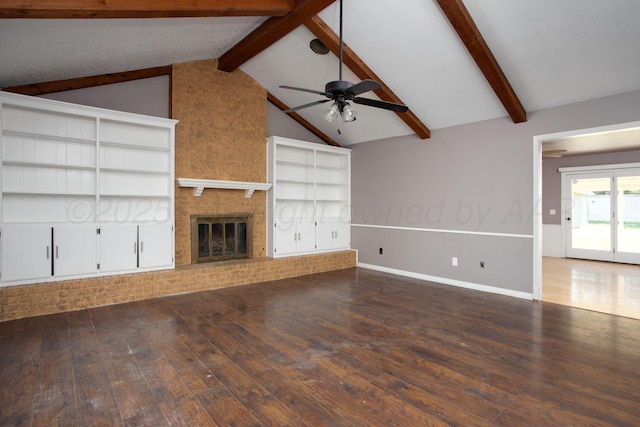 505 Alamo St, Claude, TX 79019 - unfurnished living room with wood-type flooring, a ceiling fan, a brick fireplace, and baseboards