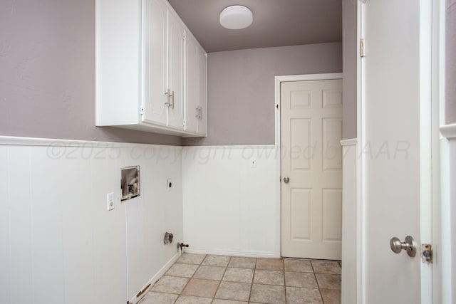 505 Alamo St, Claude, TX 79019 - washroom with cabinet space, electric dryer hookup, hookup for a washing machine, and wainscoting