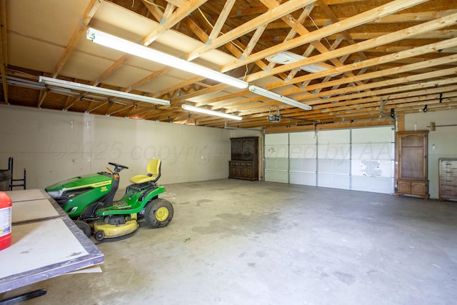 505 Alamo St, Claude, TX 79019 - garage featuring a garage door opener