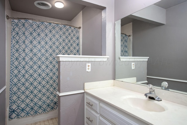 505 Alamo St, Claude, TX 79019 - bathroom with vanity and a shower with shower curtain