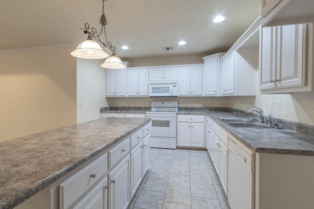 3520 S Mirror St, Amarillo, TX 79118 - kitchen with white appliances, white cabinetry, hanging light fixtures, dark countertops, and ornamental molding