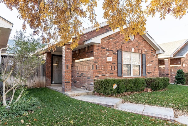 3520 S Mirror St, Amarillo, TX 79118 - view of front of property with brick siding and a front lawn