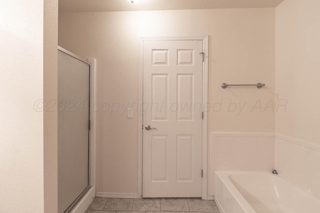 3520 S Mirror St, Amarillo, TX 79118 - bathroom with a garden tub, a stall shower, and tile patterned flooring