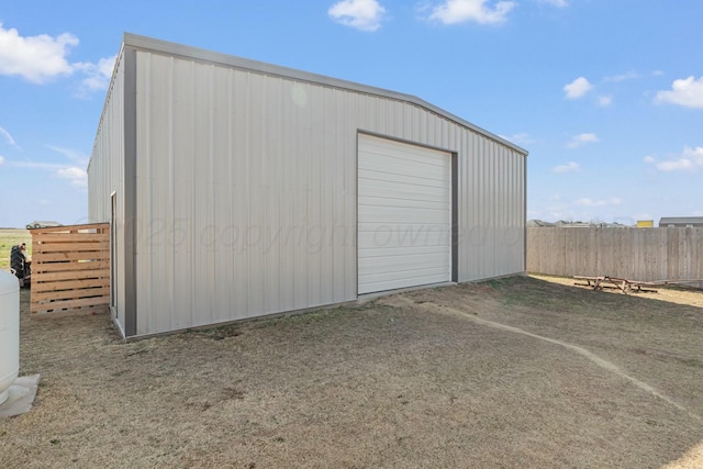 3851 Whitetail Springs Rd, Amarillo, TX 79119 - view of outdoor structure featuring an outdoor structure, fence, and dirt driveway