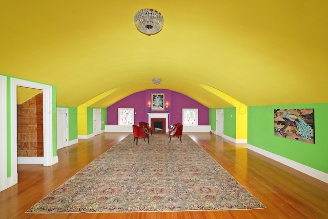 2101 S Harrison St, Amarillo, TX 79109 - playroom with lofted ceiling, wood finished floors, and baseboards