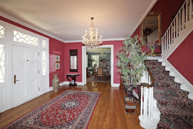 2101 S Harrison St, Amarillo, TX 79109 - entrance foyer featuring a chandelier, stairway, wood finished floors, crown molding, and baseboards