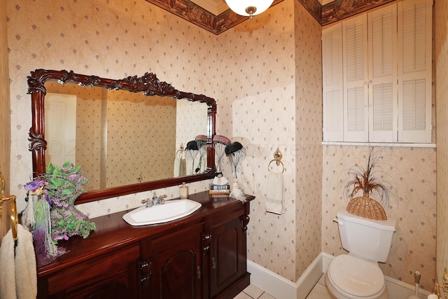 2101 S Harrison St, Amarillo, TX 79109 - bathroom featuring wallpapered walls, tile patterned flooring, toilet, baseboards, and vanity