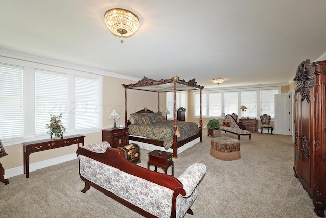 2101 S Harrison St, Amarillo, TX 79109 - bedroom with light carpet, ornamental molding, and baseboards