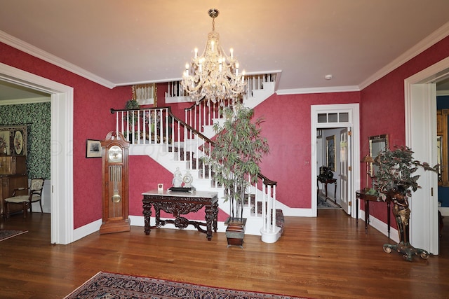 2101 S Harrison St, Amarillo, TX 79109 - foyer entrance featuring wood finished floors, stairway, a chandelier, crown molding, and baseboards