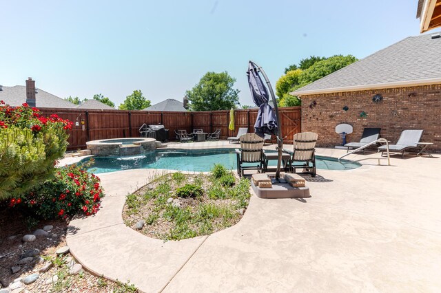 7809 Clearmeadow Dr, Amarillo, TX 79119 - view of swimming pool featuring a fenced backyard, a patio, and a pool with connected hot tub