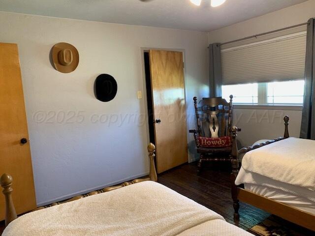 212 Farnsworth St, Farnsworth, TX 79033 - bedroom with wood finished floors