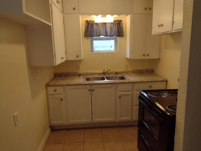kitchen featuring baseboards, a sink, white cabinetry, light countertops, and electric range