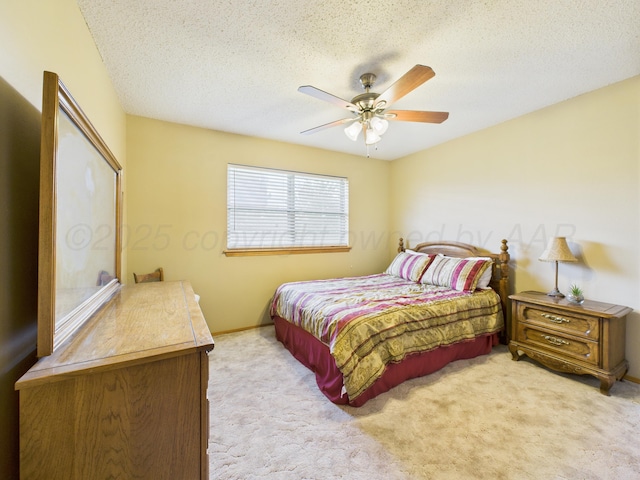 1620 N Nelson St, Pampa, TX 79065 - bedroom featuring carpet flooring, a textured ceiling, and ceiling fan