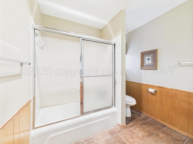 1620 N Nelson St, Pampa, TX 79065 - full bath featuring a wainscoted wall, combined bath / shower with glass door, and wood walls