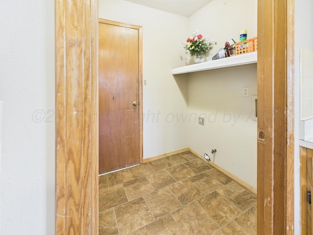 1620 N Nelson St, Pampa, TX 79065 - laundry area featuring hookup for a gas dryer and stone finish floors
