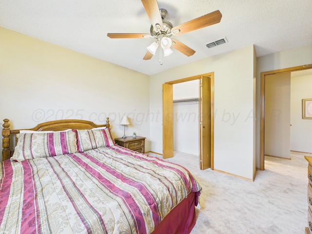 1620 N Nelson St, Pampa, TX 79065 - bedroom featuring light colored carpet, ceiling fan, and a textured ceiling