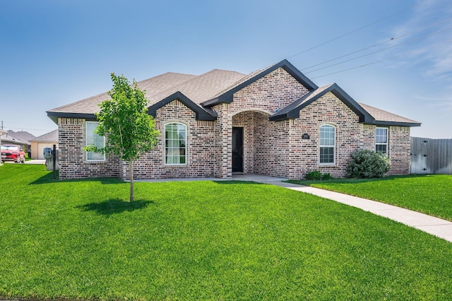 8309 City View Dr, Amarillo, TX 79118 - french country inspired facade with brick siding and a shingled roof