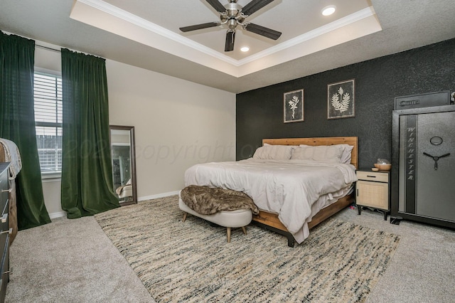 8309 City View Dr, Amarillo, TX 79118 - bedroom with a tray ceiling, light colored carpet, ornamental molding, recessed lighting, and a ceiling fan