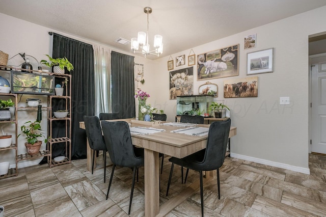 8309 City View Dr, Amarillo, TX 79118 - dining space with a chandelier and baseboards