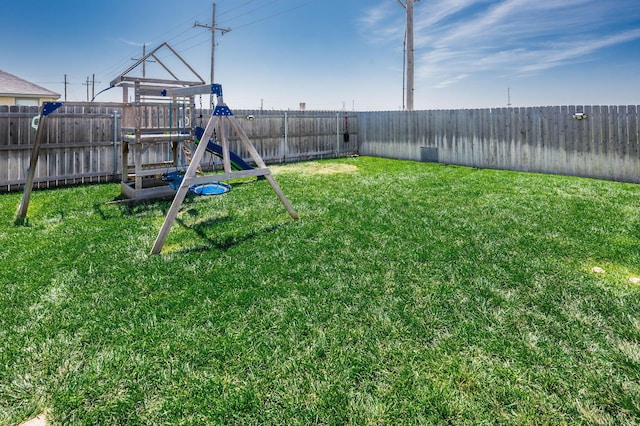 8309 City View Dr, Amarillo, TX 79118 - fenced backyard featuring a playground