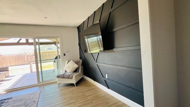 living area featuring light hardwood / wood-style flooring