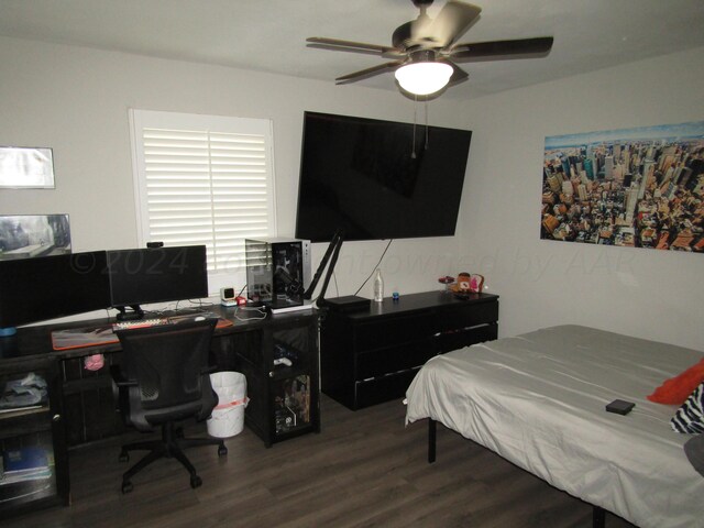 bedroom with wood-type flooring and ceiling fan