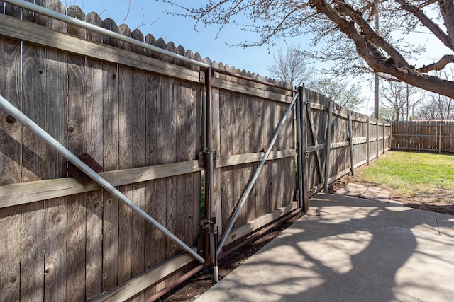 view of patio featuring fence
