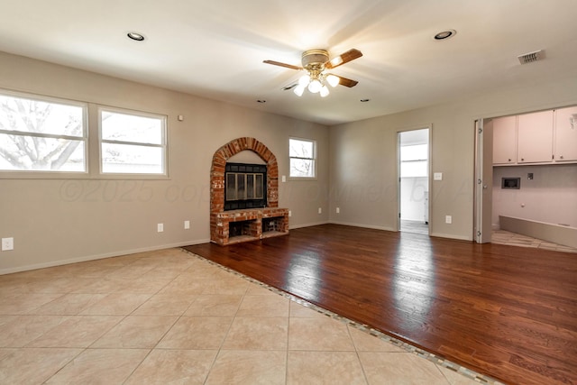 unfurnished living room with baseboards, recessed lighting, light wood-style floors, visible vents, and ceiling fan