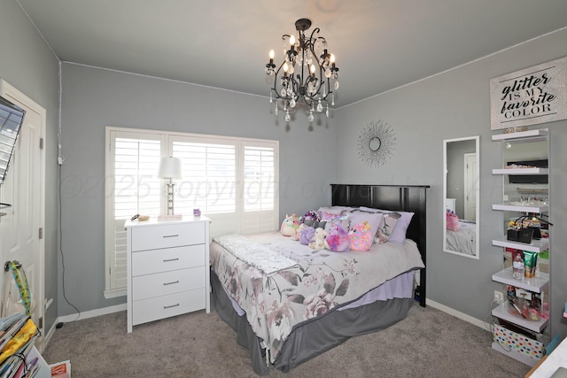 bedroom featuring carpet flooring, baseboards, and a notable chandelier
