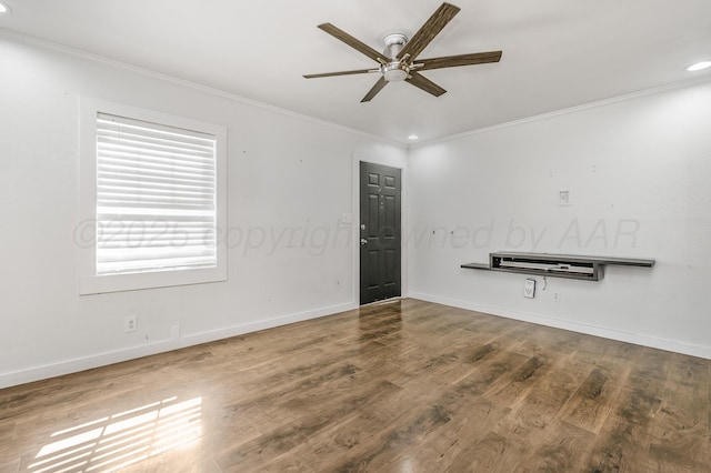 spare room featuring ceiling fan, baseboards, ornamental molding, and recessed lighting