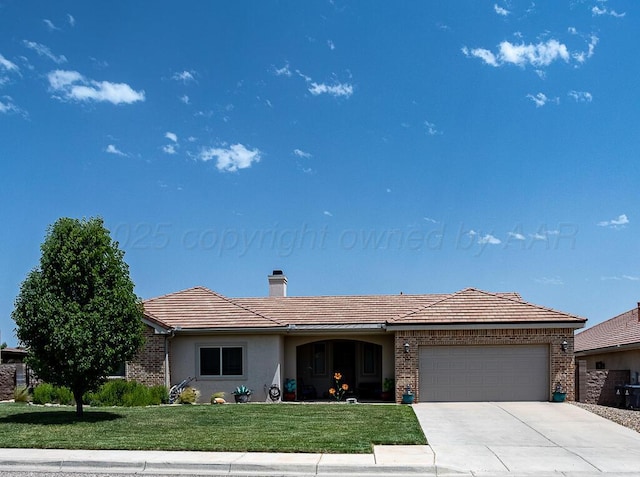 1006 Pinot Blvd, Amarillo, TX 79124 - single story home with an attached garage, a tile roof, a front yard, and brick siding