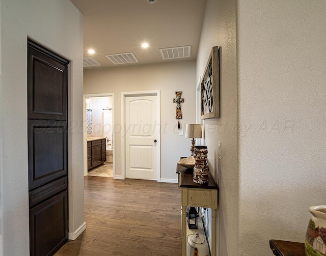1006 Pinot Blvd, Amarillo, TX 79124 - corridor with dark wood-style floors and recessed lighting