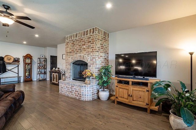 1006 Pinot Blvd, Amarillo, TX 79124 - living area featuring a ceiling fan, wood finished floors, a brick fireplace, and recessed lighting