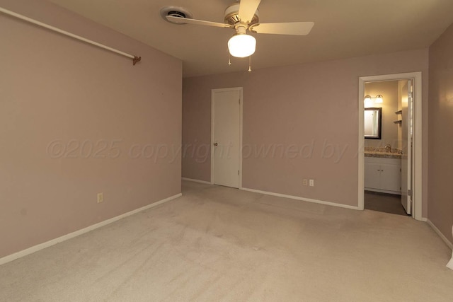 4903 Princeton St, Amarillo, TX 79109 - unfurnished bedroom featuring carpet flooring, baseboards, ensuite bathroom, and a sink