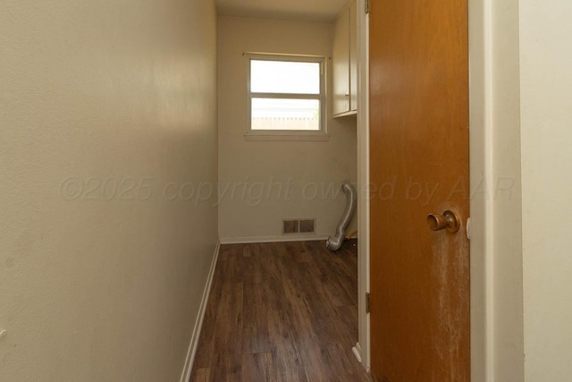 4903 Princeton St, Amarillo, TX 79109 - washroom featuring baseboards and dark wood-style flooring