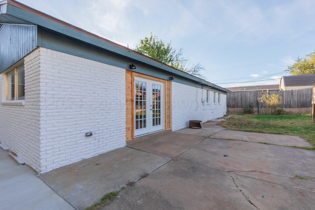 exterior space with a patio and french doors