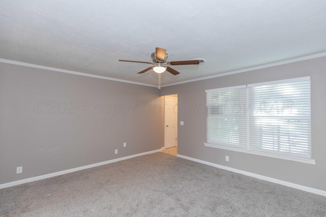 unfurnished room featuring a textured ceiling, ceiling fan, carpet floors, and ornamental molding