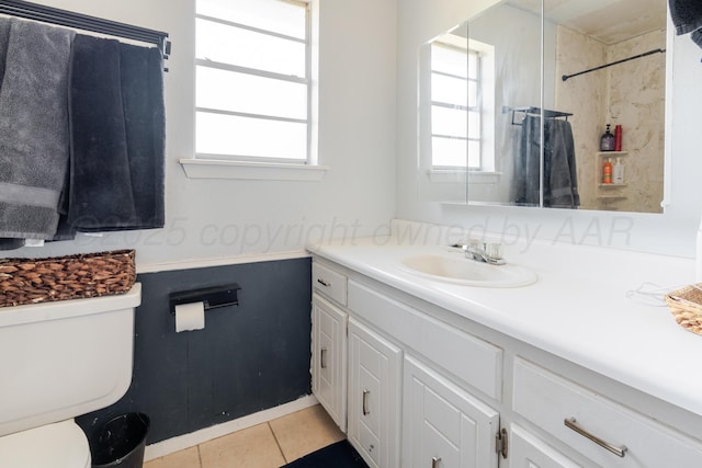 5210 S Milam St, Amarillo, TX 79110 - full bath featuring vanity, tile patterned floors, and a shower