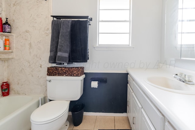 5210 S Milam St, Amarillo, TX 79110 - bathroom featuring vanity, healthy amount of natural light, tile patterned flooring, and a tub