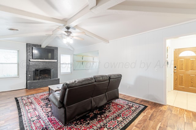 5210 S Milam St, Amarillo, TX 79110 - living area featuring ceiling fan, wood finished floors, and a brick fireplace