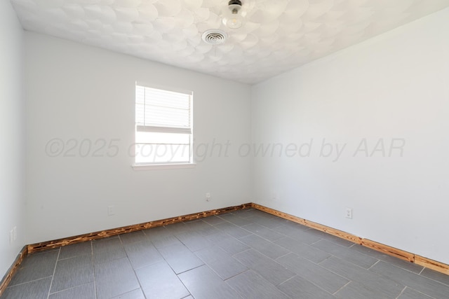 5210 S Milam St, Amarillo, TX 79110 - spare room featuring baseboards