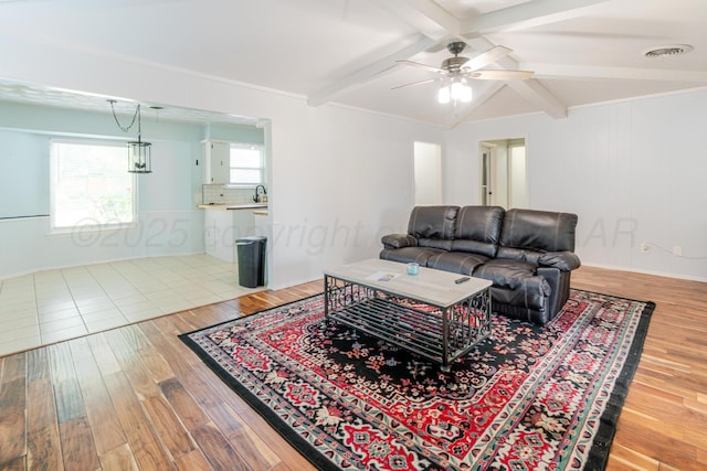 5210 S Milam St, Amarillo, TX 79110 - living area with ceiling fan and wood finished floors